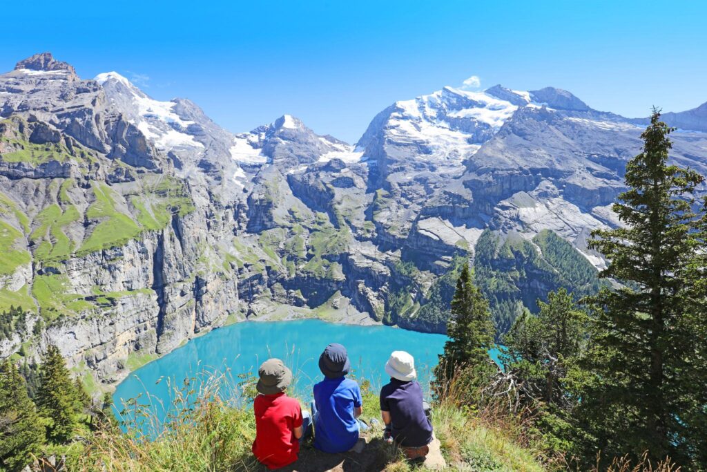 Children looking over Oeschinensee Kandersteg