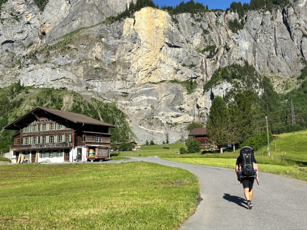 Toddler being carried in a backpack to go to the Allmenalp cable car in Kandersteg